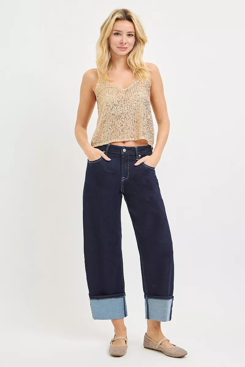 Model wearing RISEN slouchy cropped barrel jeans street style look