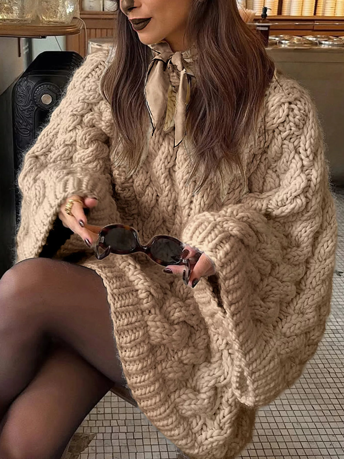 Cable knit round neck sweater, back view
