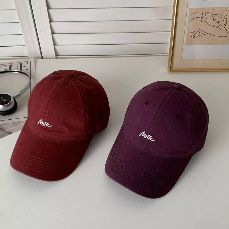Embroidered letter baseball cap, front view