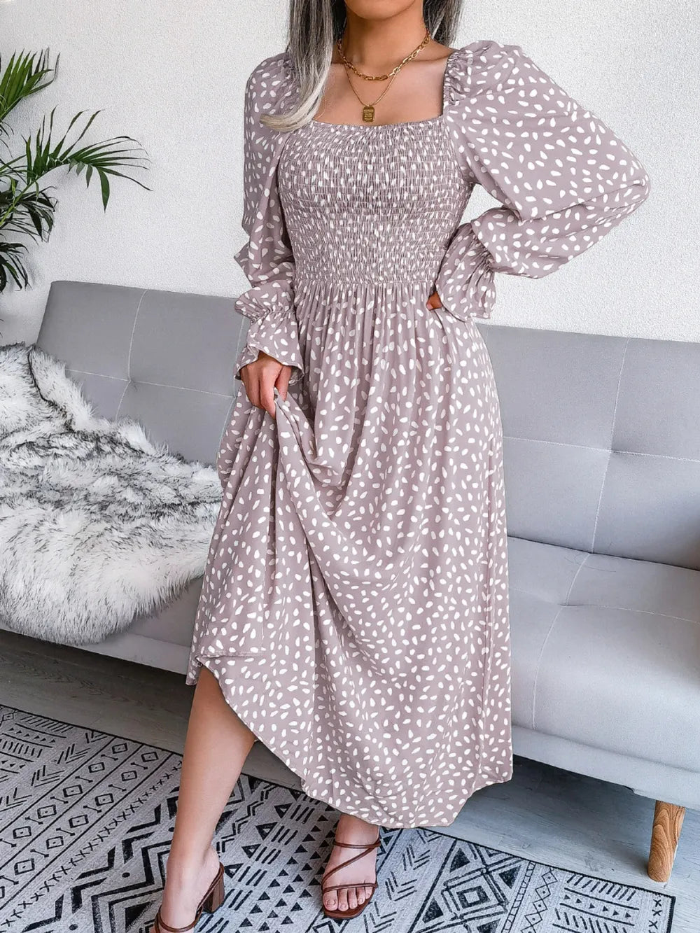 Smocked square neck flounce sleeve dress styled with heels