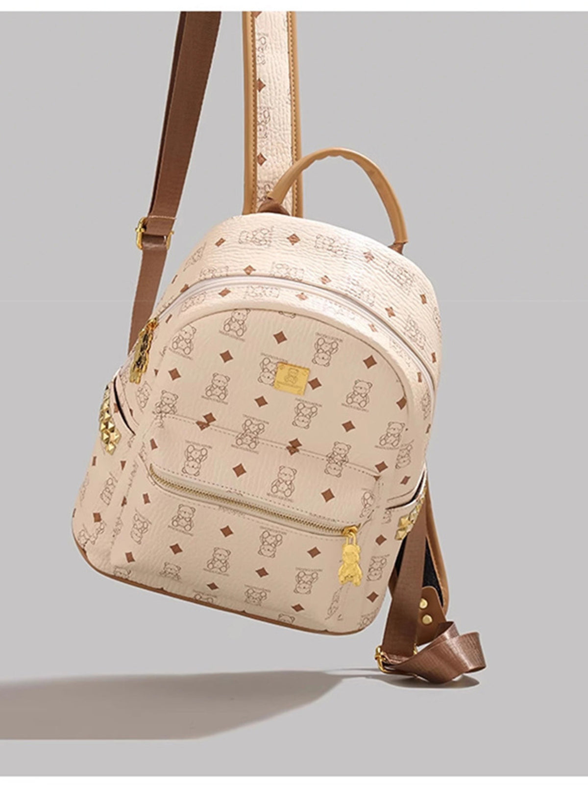 Cream bear mini backpack close up of the material