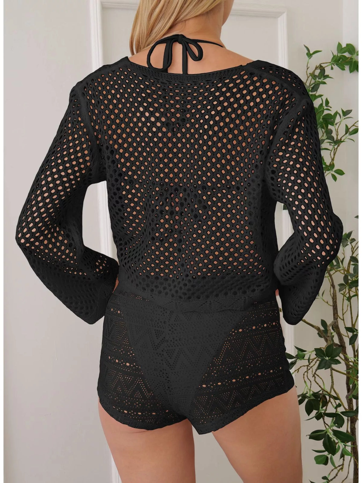 Tie front crochet top on model