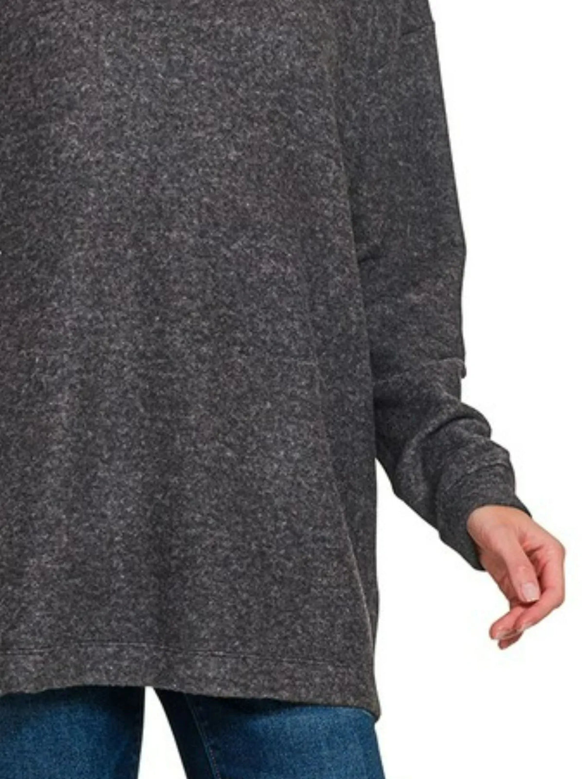 Oversized hooded knit sweater side detail view