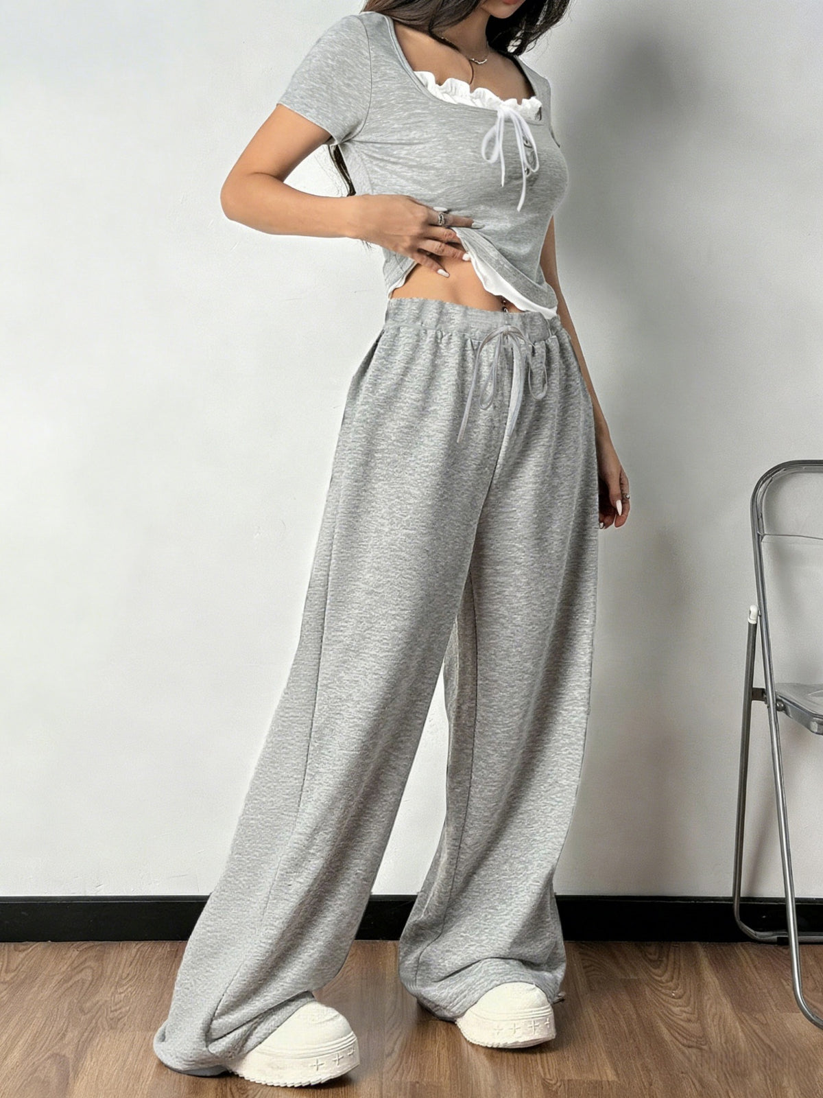 Coordinated grey pants set back view