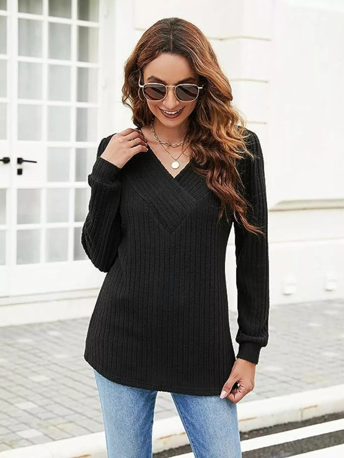 V neck ribbed long sleeve knit top side view