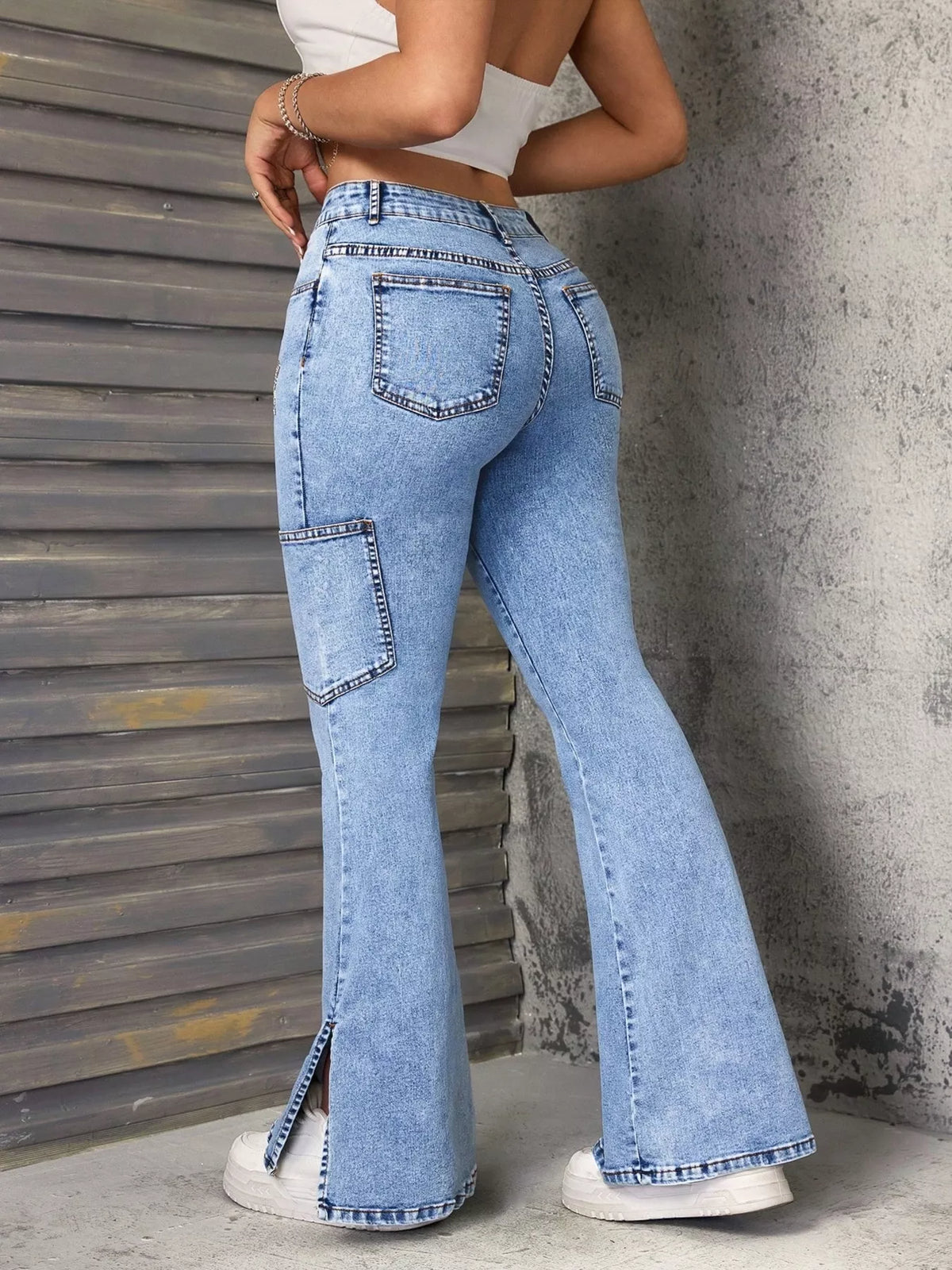 High waist blue flare leg denim full length view