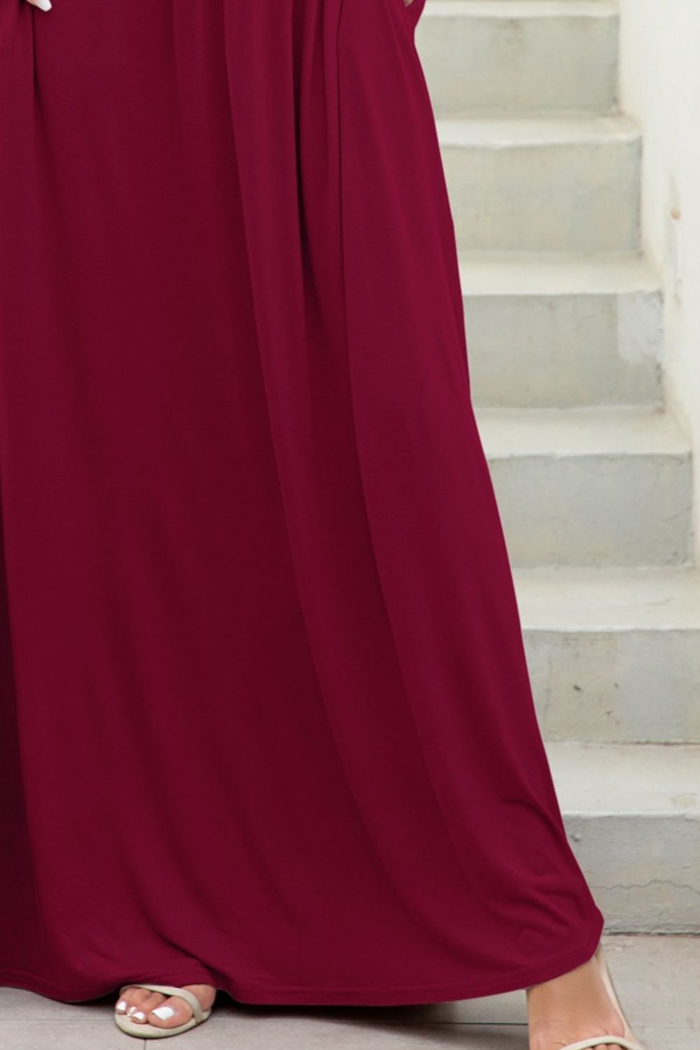 round neck maxi tee dress with pockets three quarter view