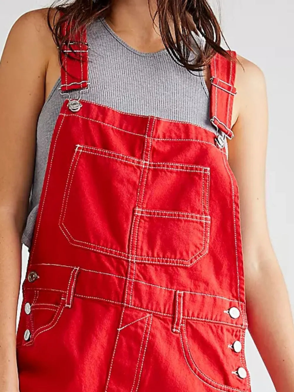 Square neck detail on red denim overalls