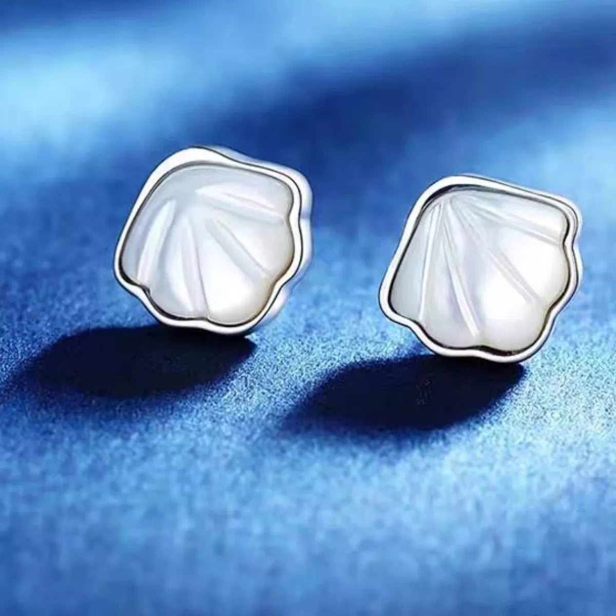 925 sterling silver shell stud earrings, front view
