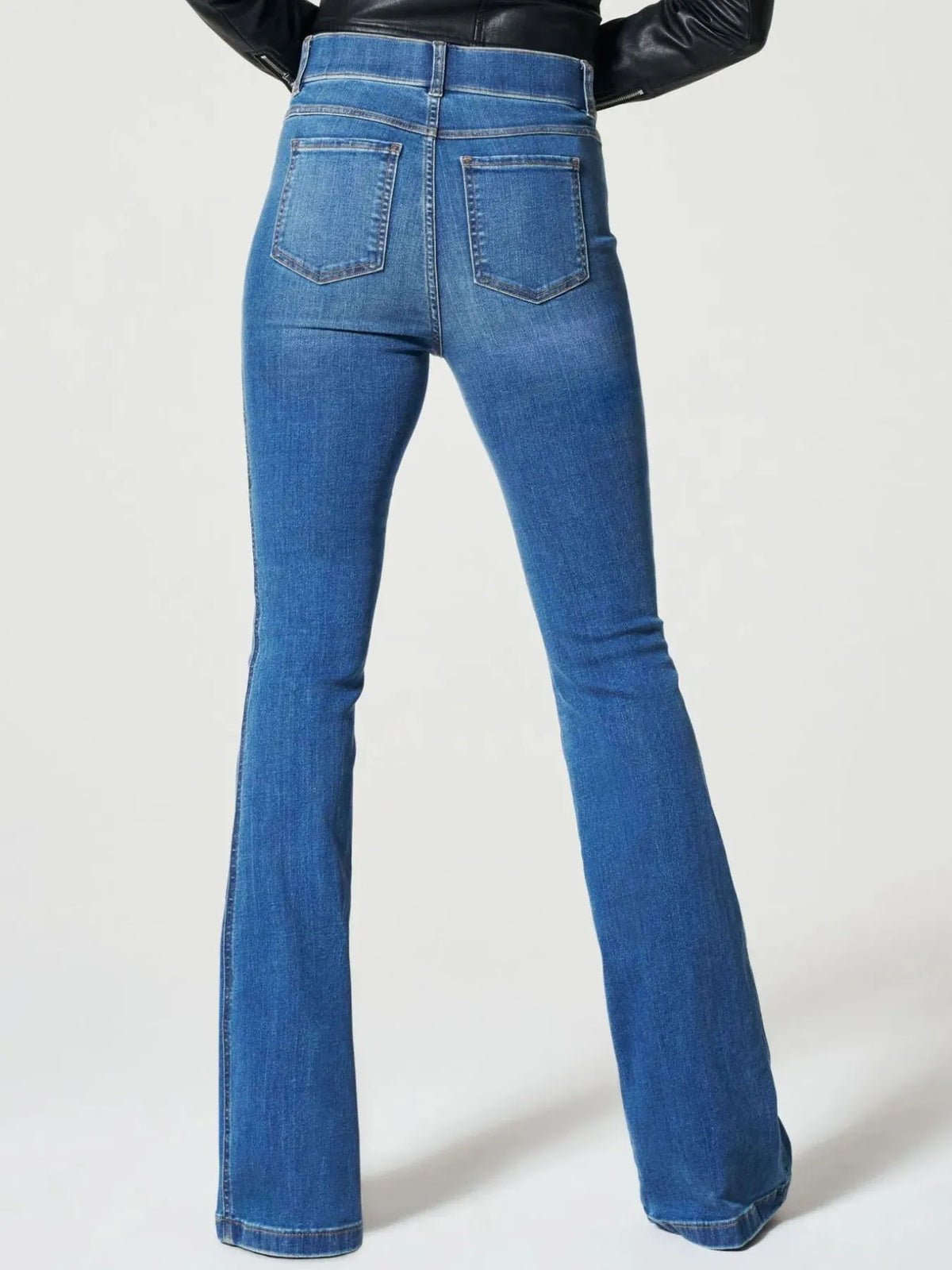 Alternate wash of high waisted flare jeans