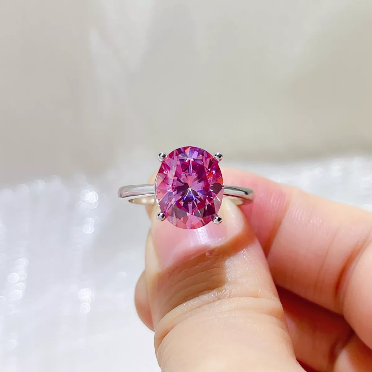 Five carat pink statement ring worn on the hand