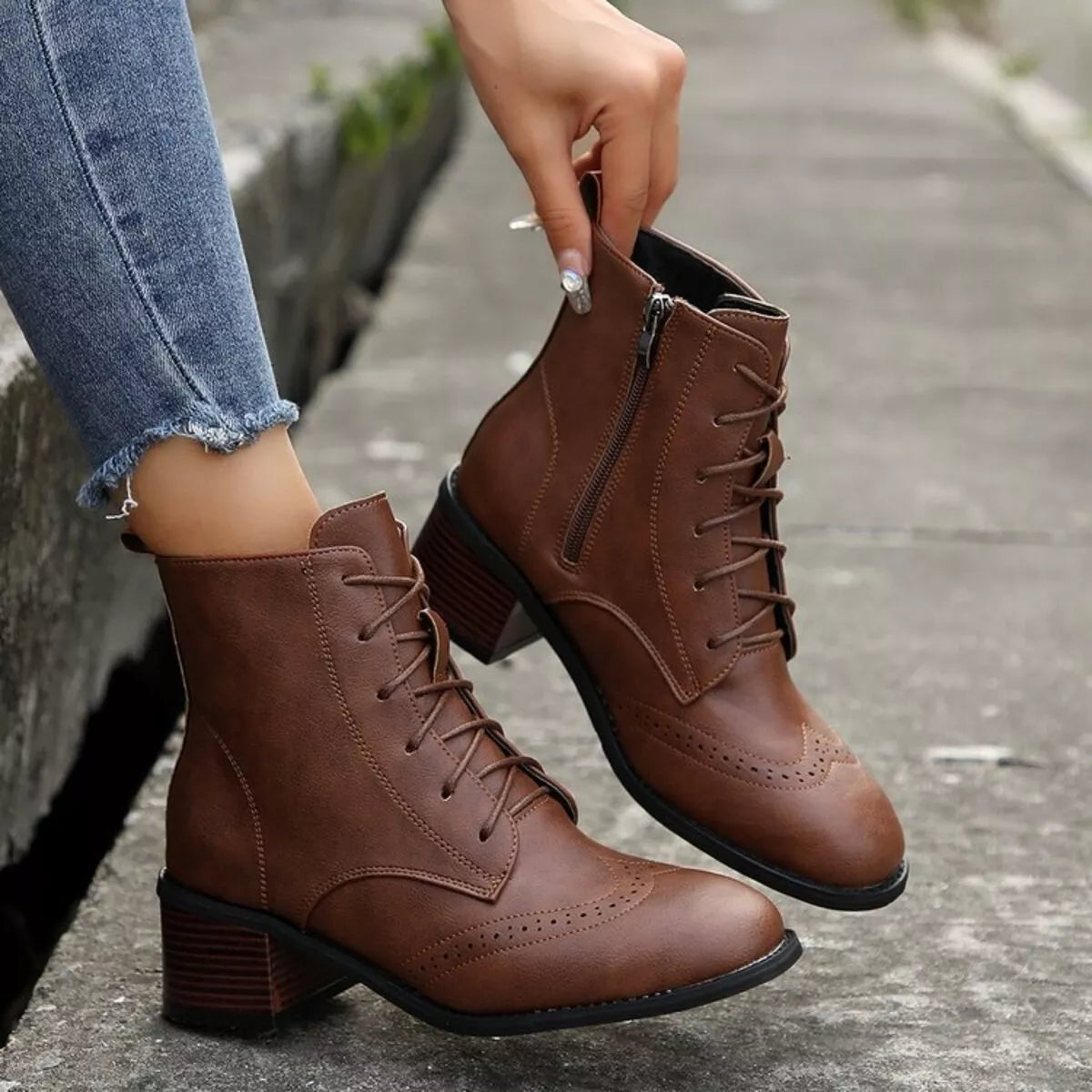 Lace up ankle boots with zipper upper stitching detail