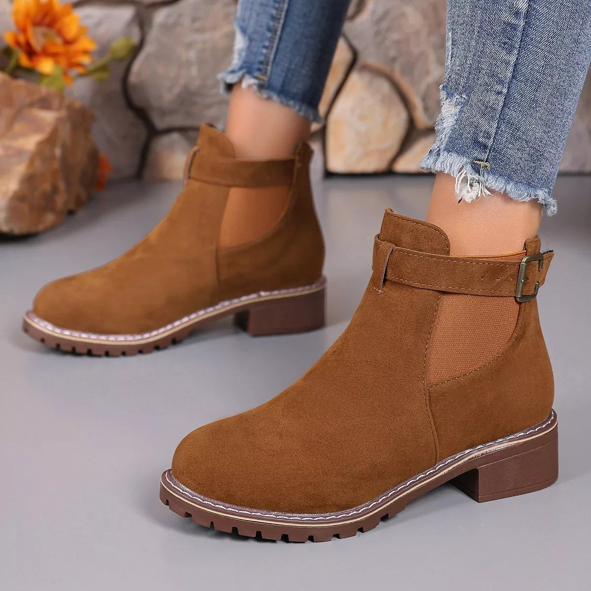 Round toe block heel boots sole view