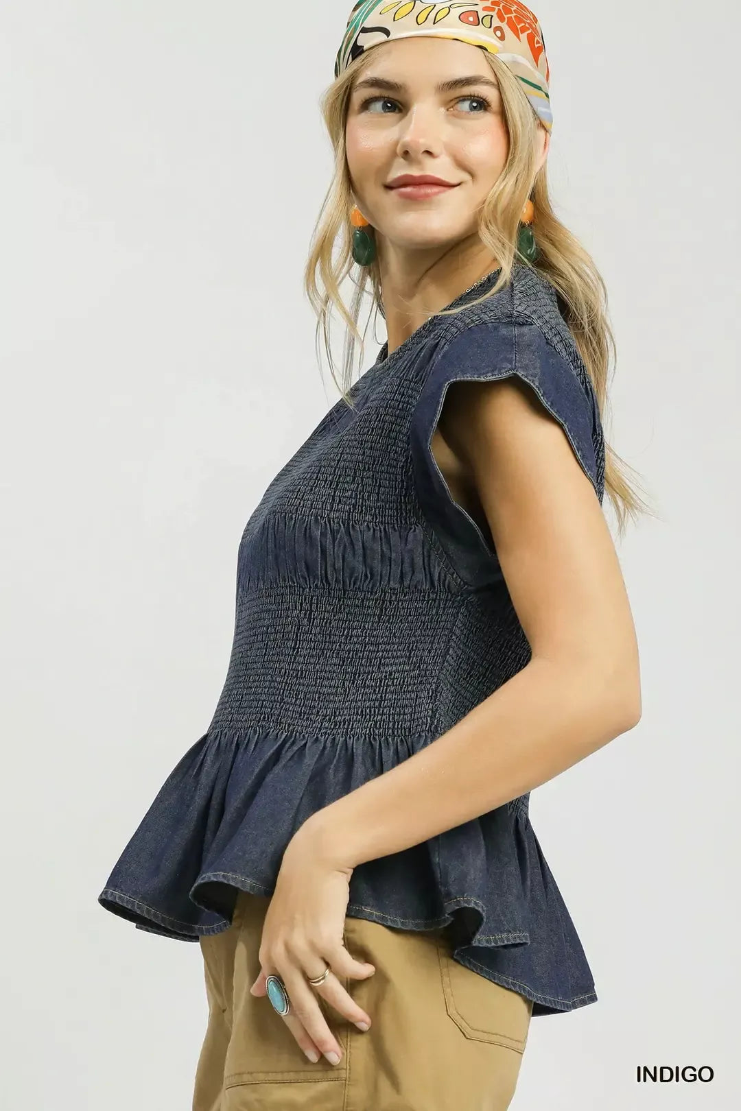 Indigo peplum top scalloped ruffle cap sleeve detail