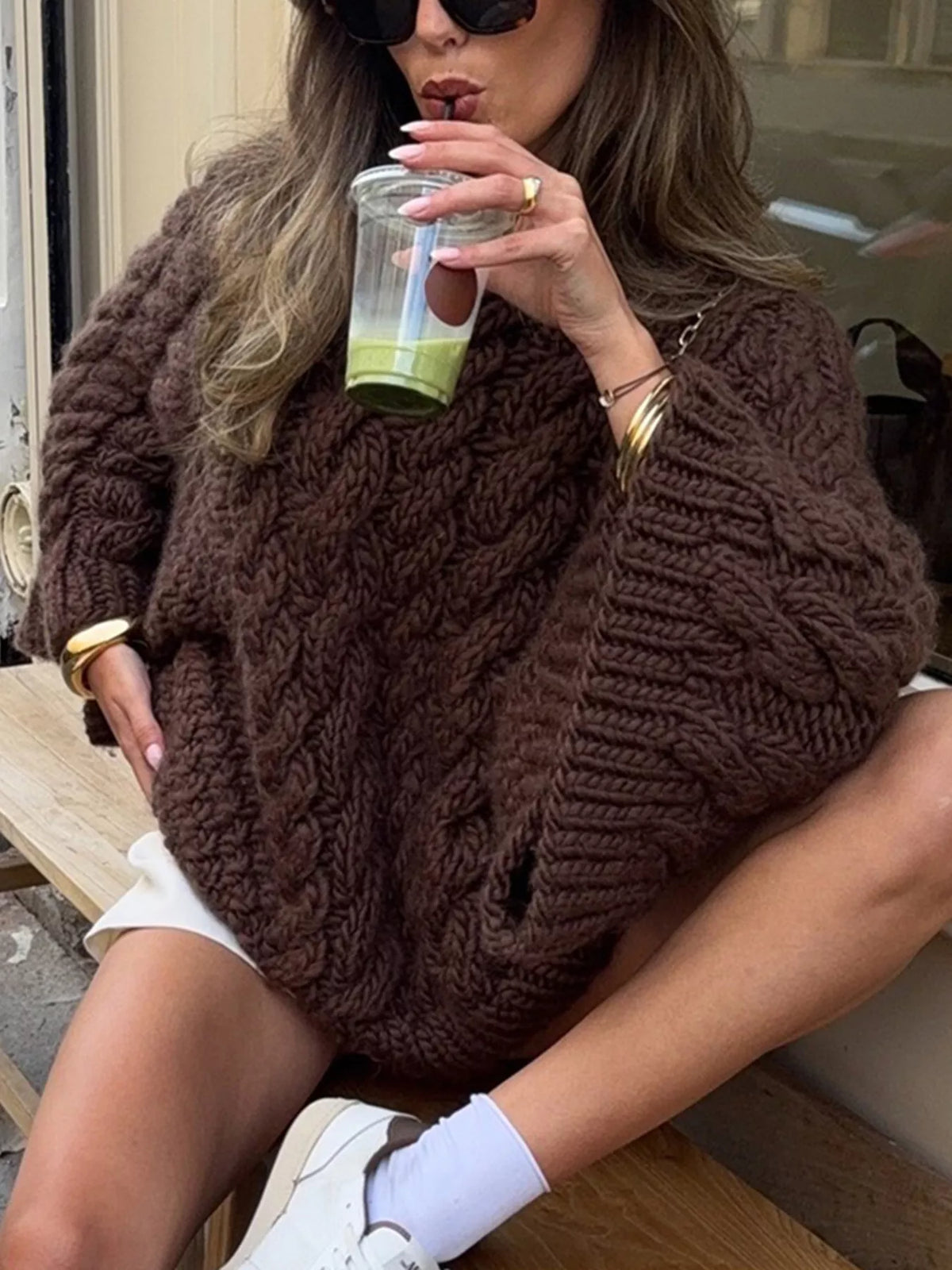 Cable knit round neck sweater, hem detail