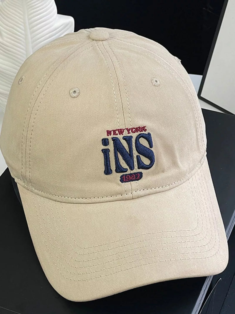 Embroidered cotton baseball cap shown in black