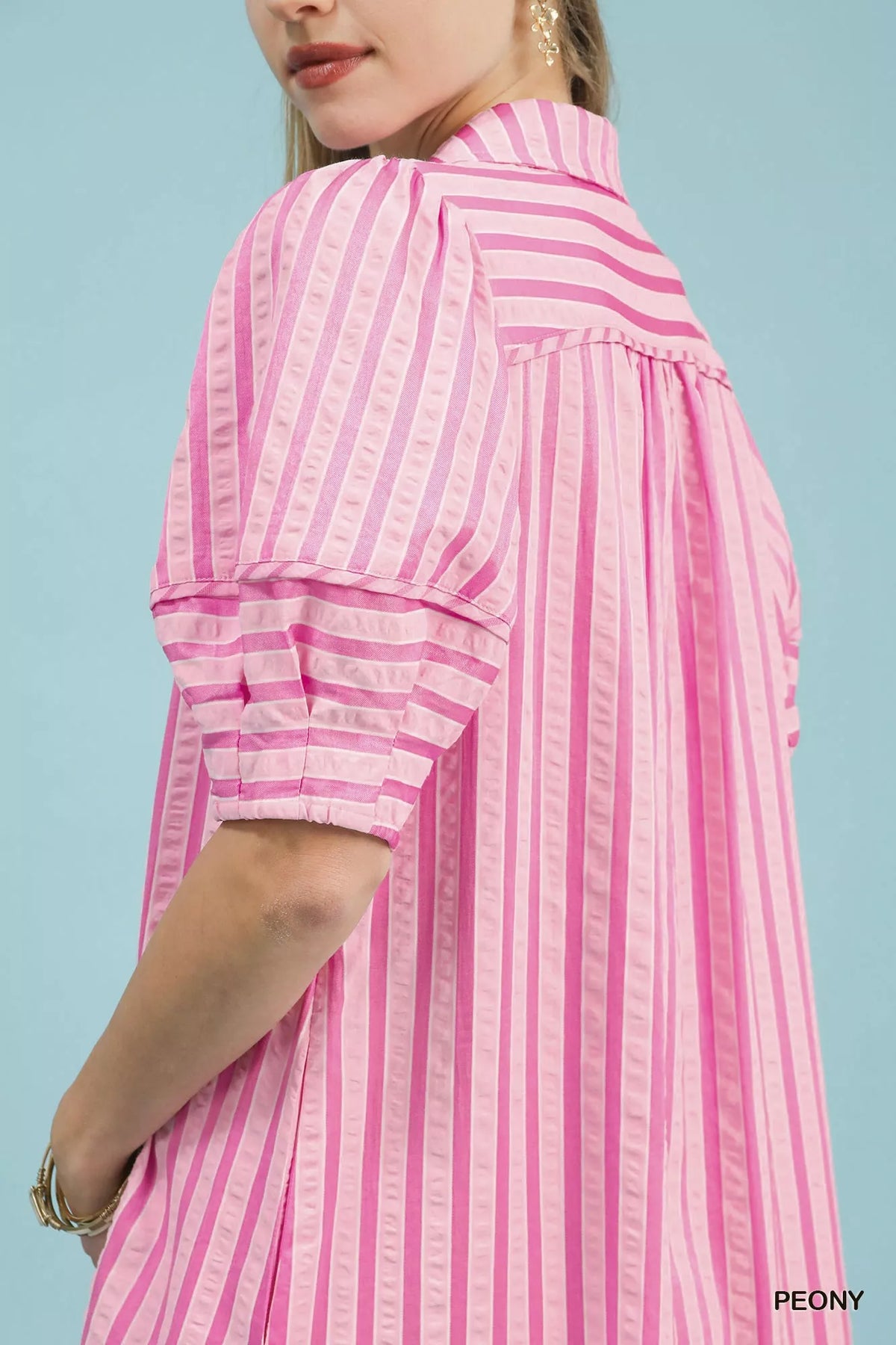 Striped midi dress with pockets worn with sandals