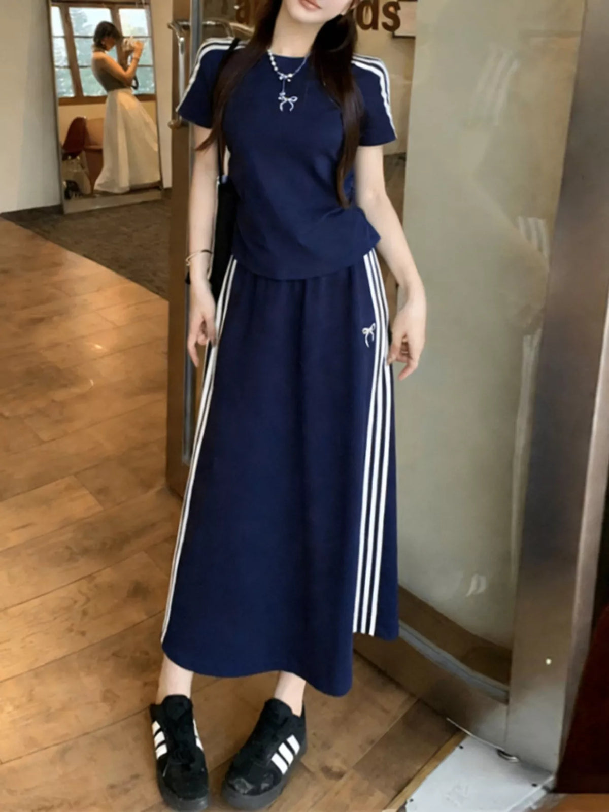 Striped round neck tee and skirt two piece set front view