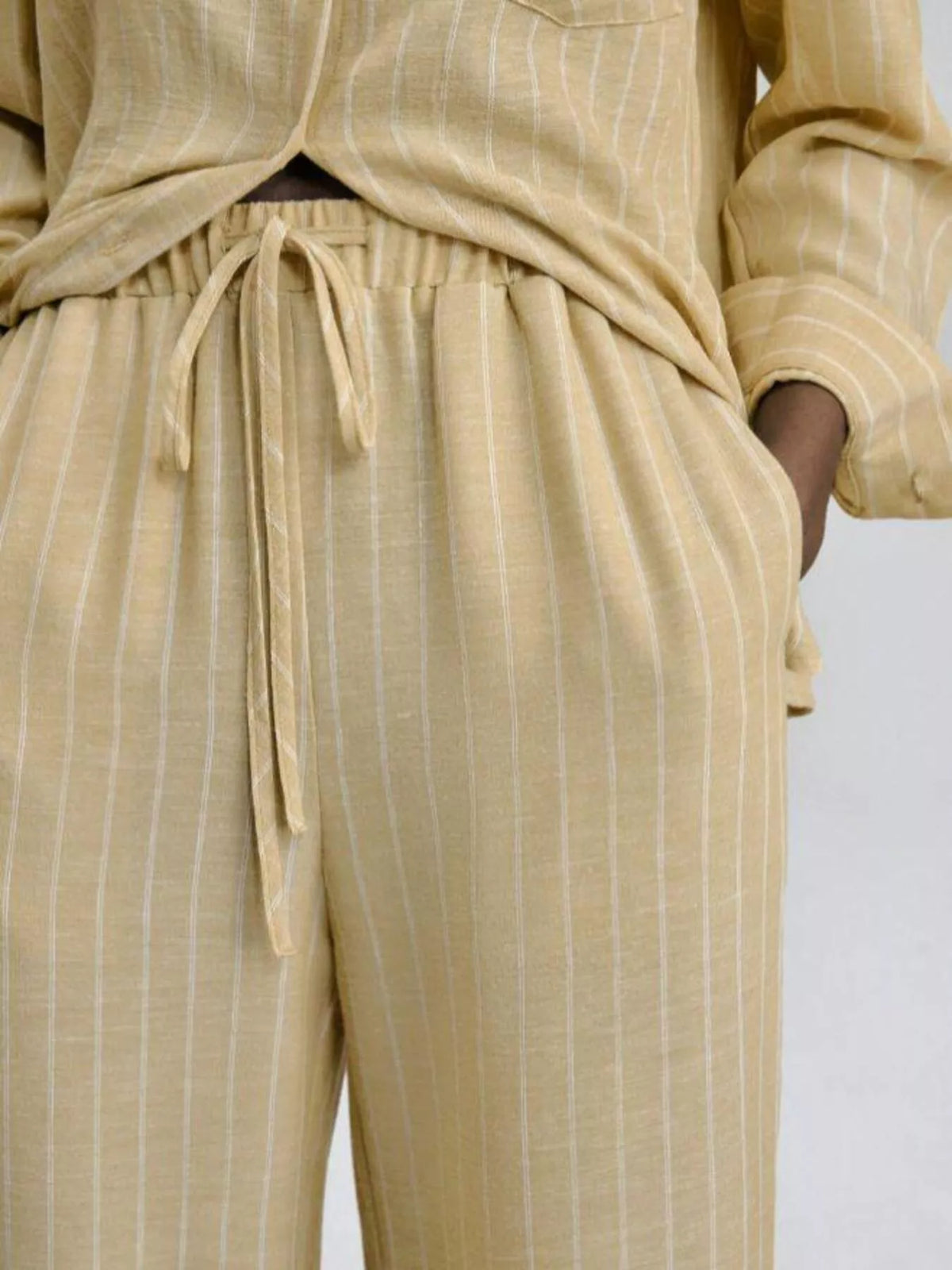 Coordinated striped shirt and pants set side view