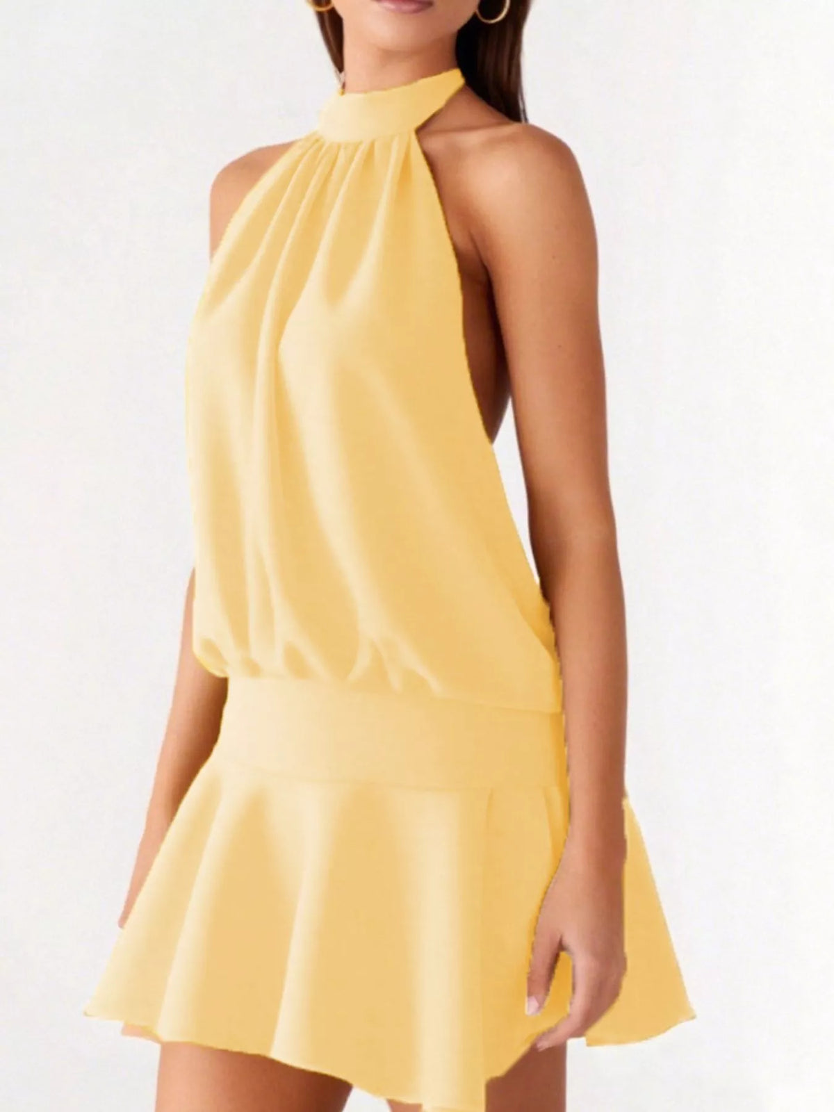Open back detail on the halter neck dress