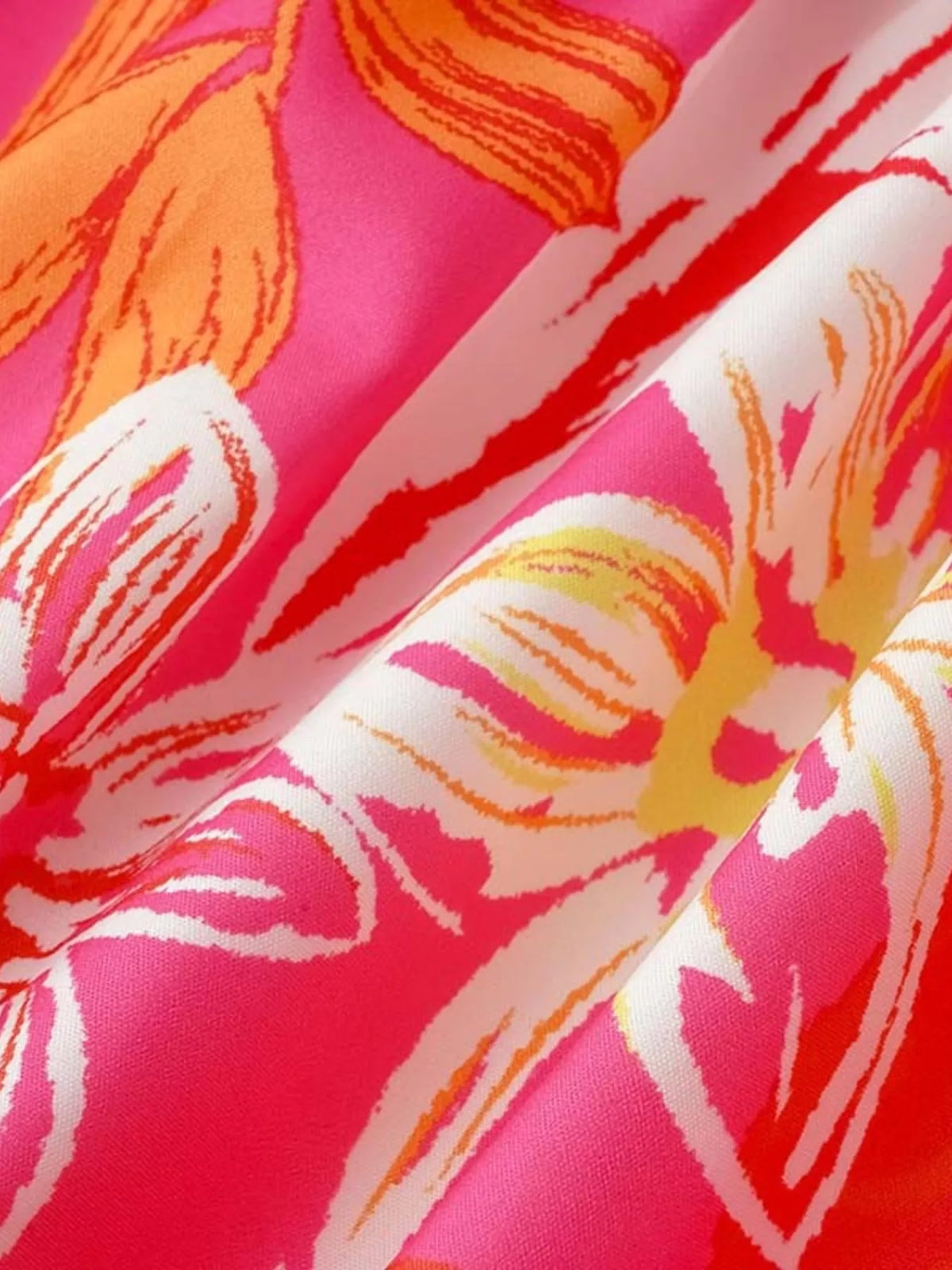 Tropical print smocked tie strap dress back view