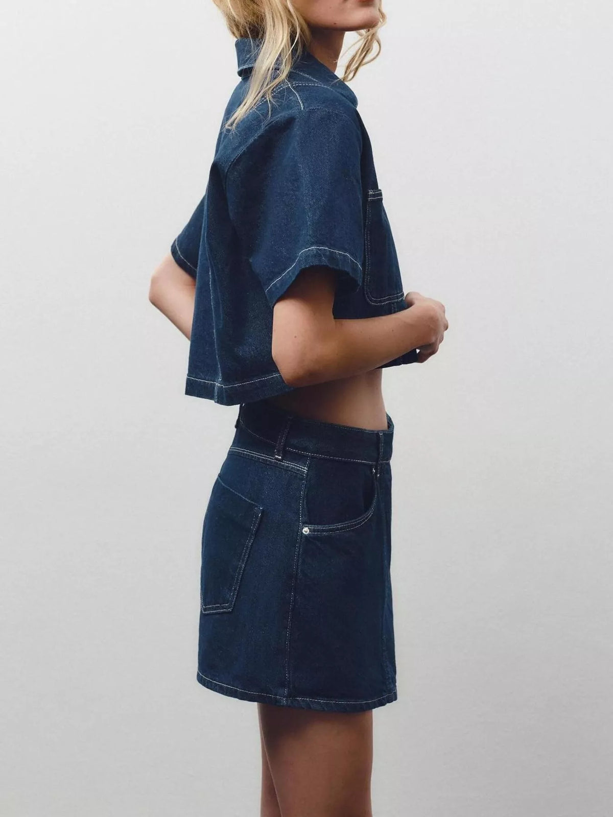 Button up top and denim skort movement view