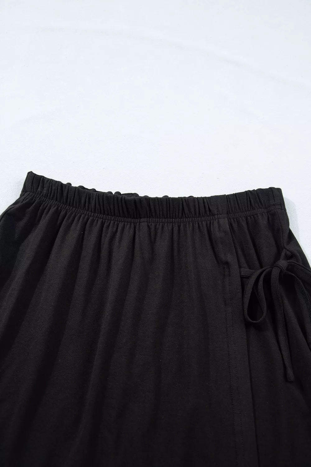 Black wrap skort set fabric detail