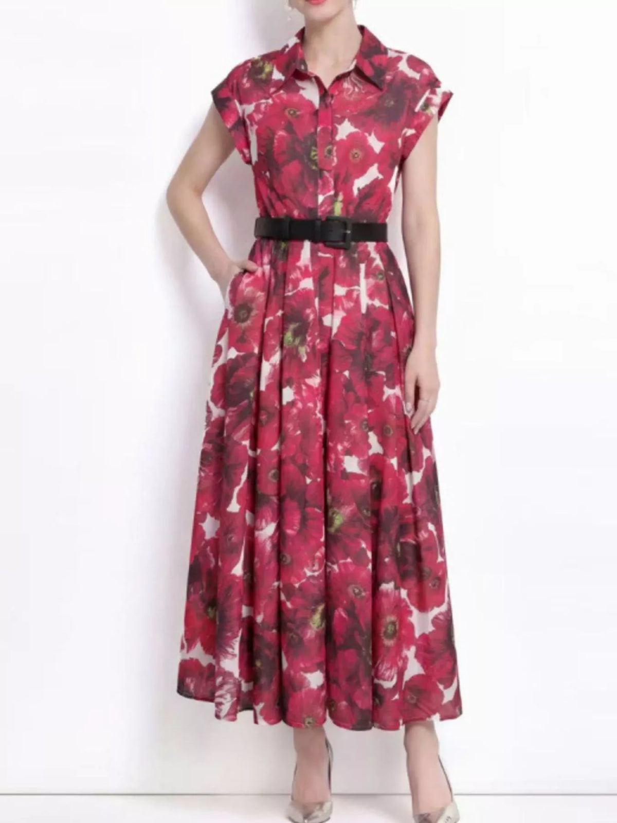 Printed dress fabric and button detail close up