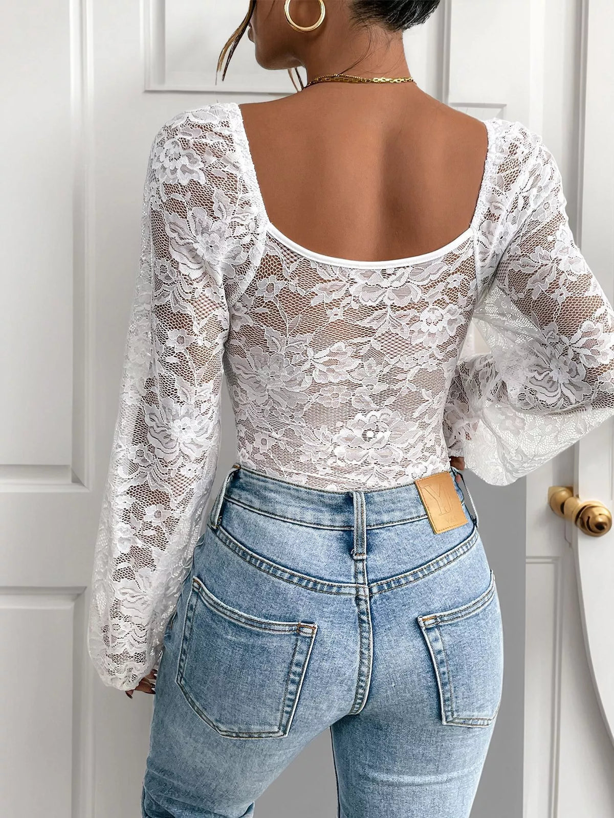 Full length styling view of the lace bodysuit