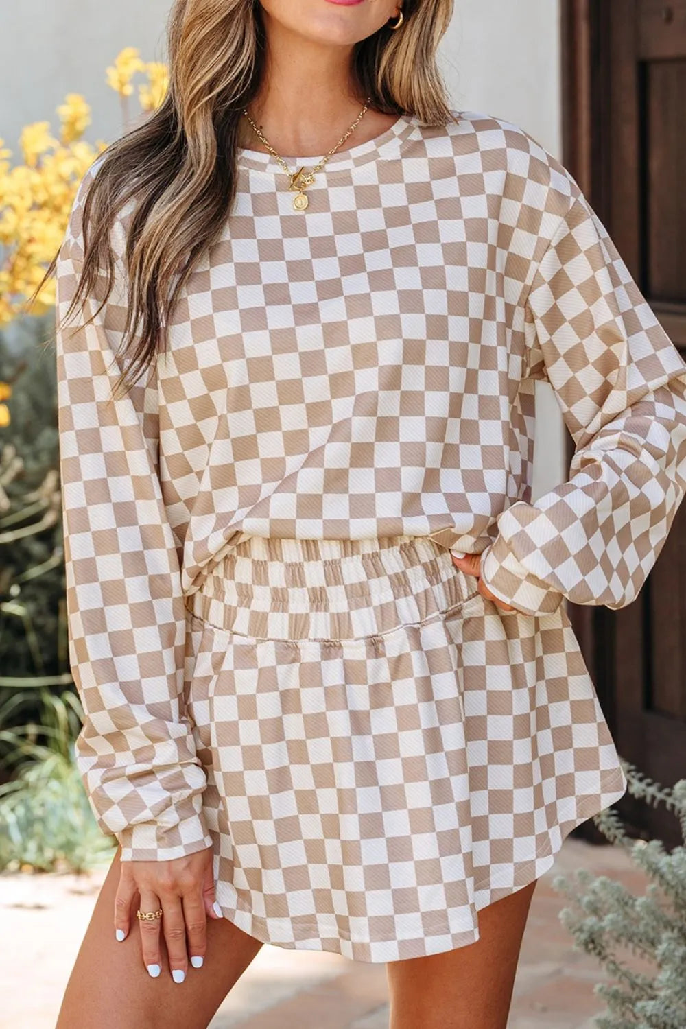 Checkered Long Sleeve Top and Skirt Two Piece Set on model