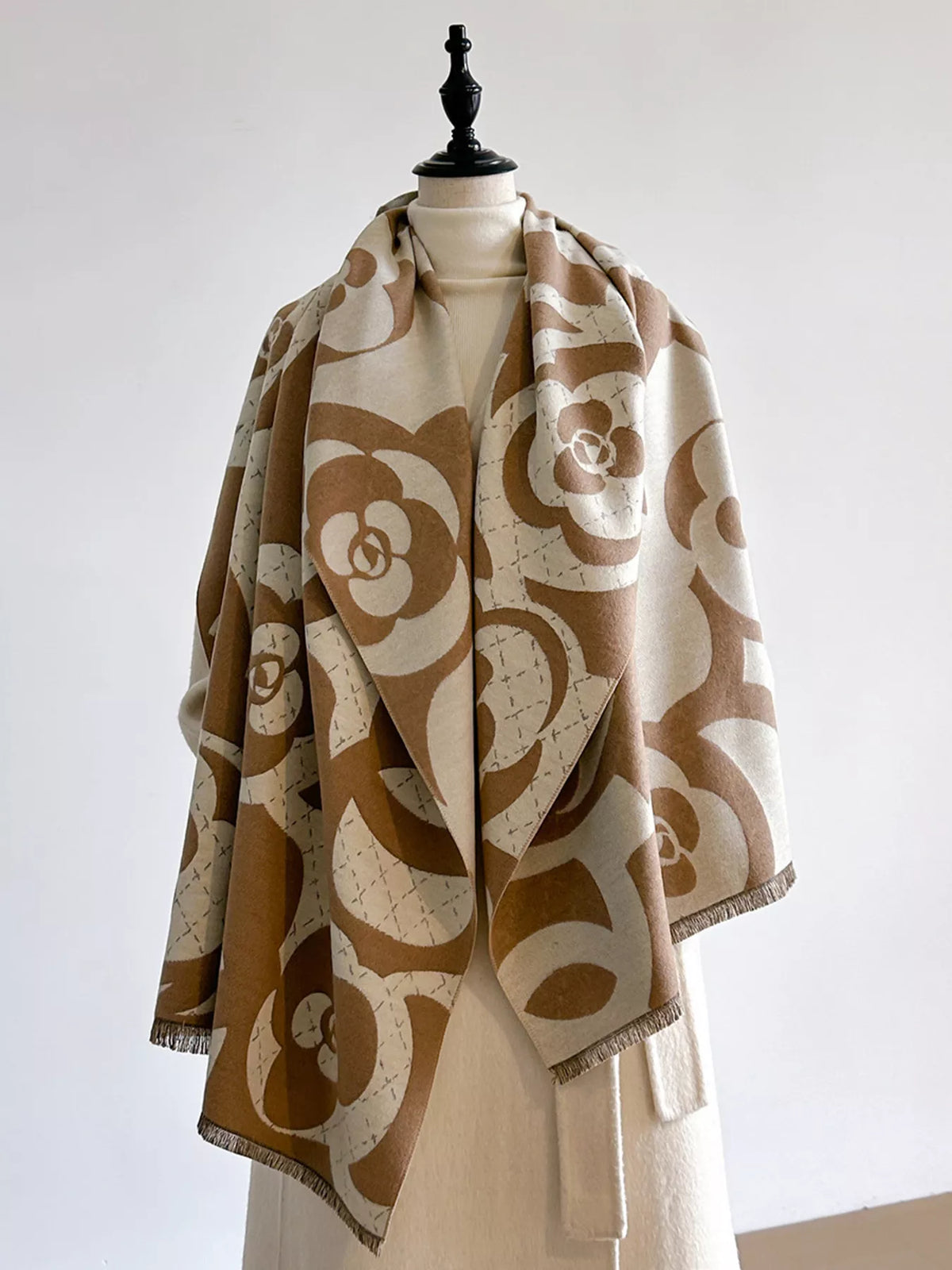 Warm floral scarf shown at full length