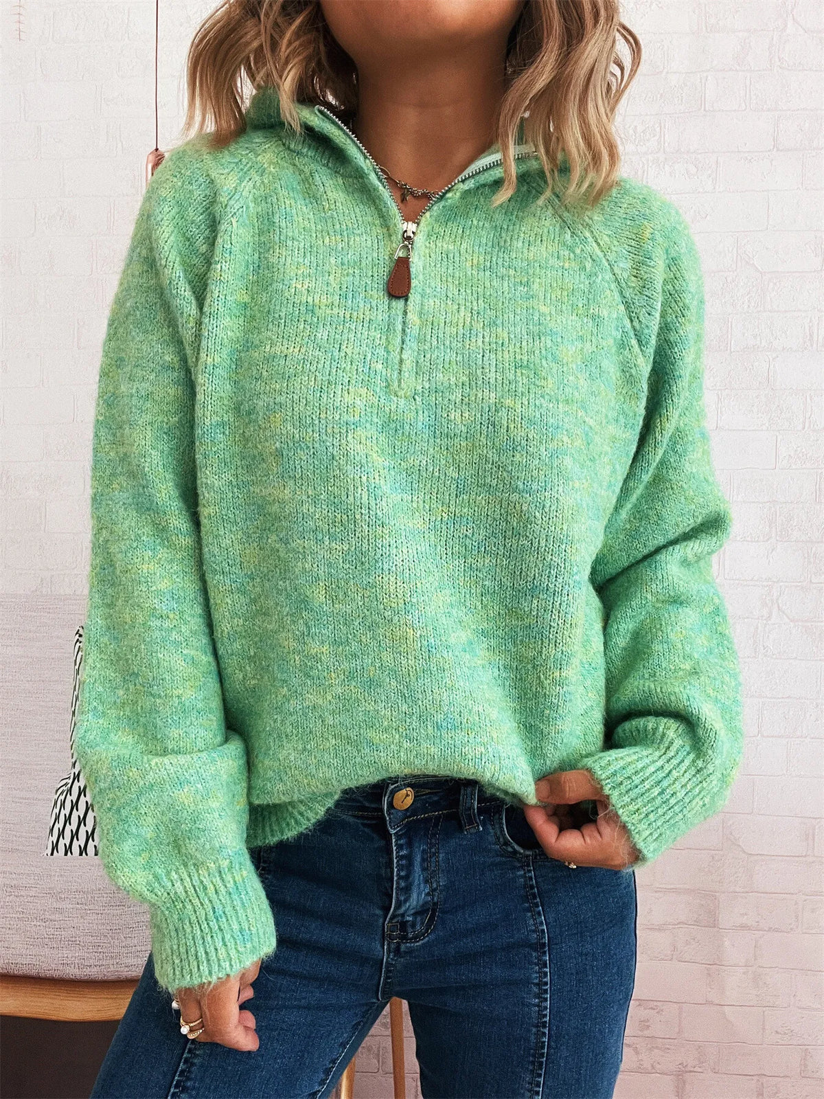 Ribbed hem sweater styled with jeans