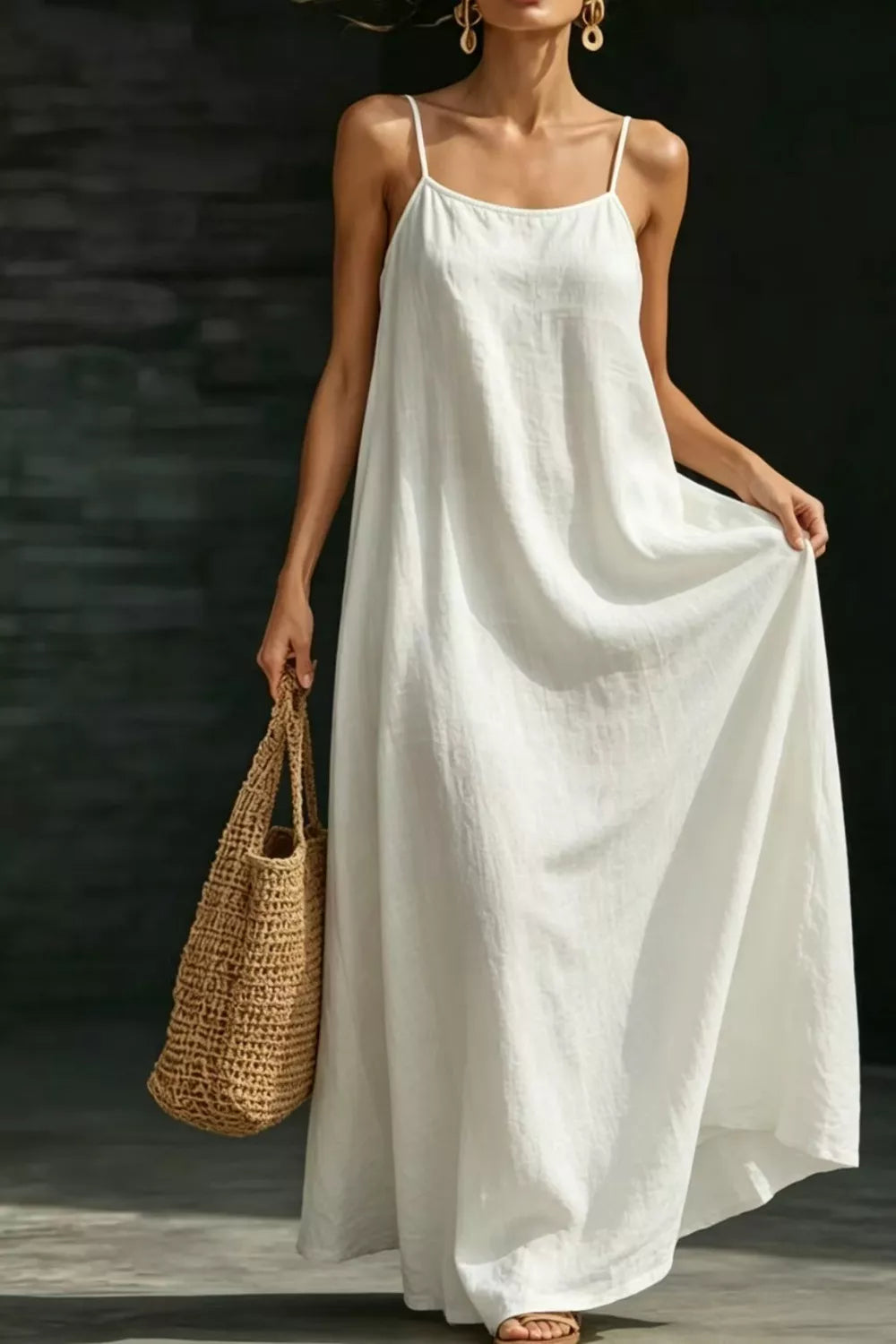 White sleeveless maxi dress neckline detail