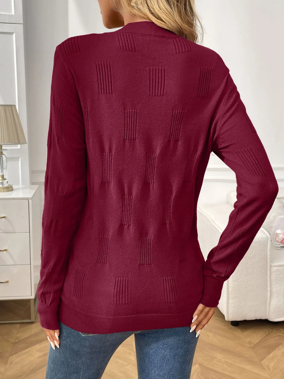 Round neck long sleeve ribbed knit top close up