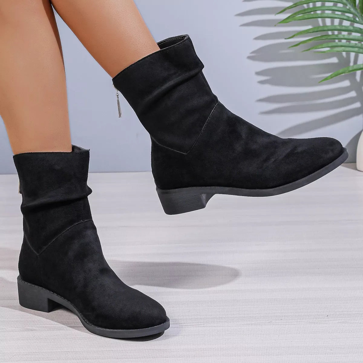 Suede Point Toe Block Heel Boots close up of the sole