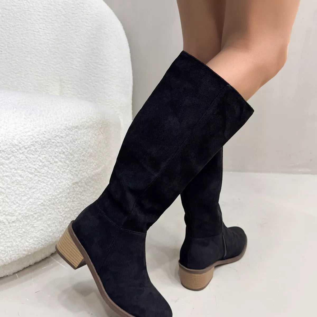 Black round toe block heels boots front facing view