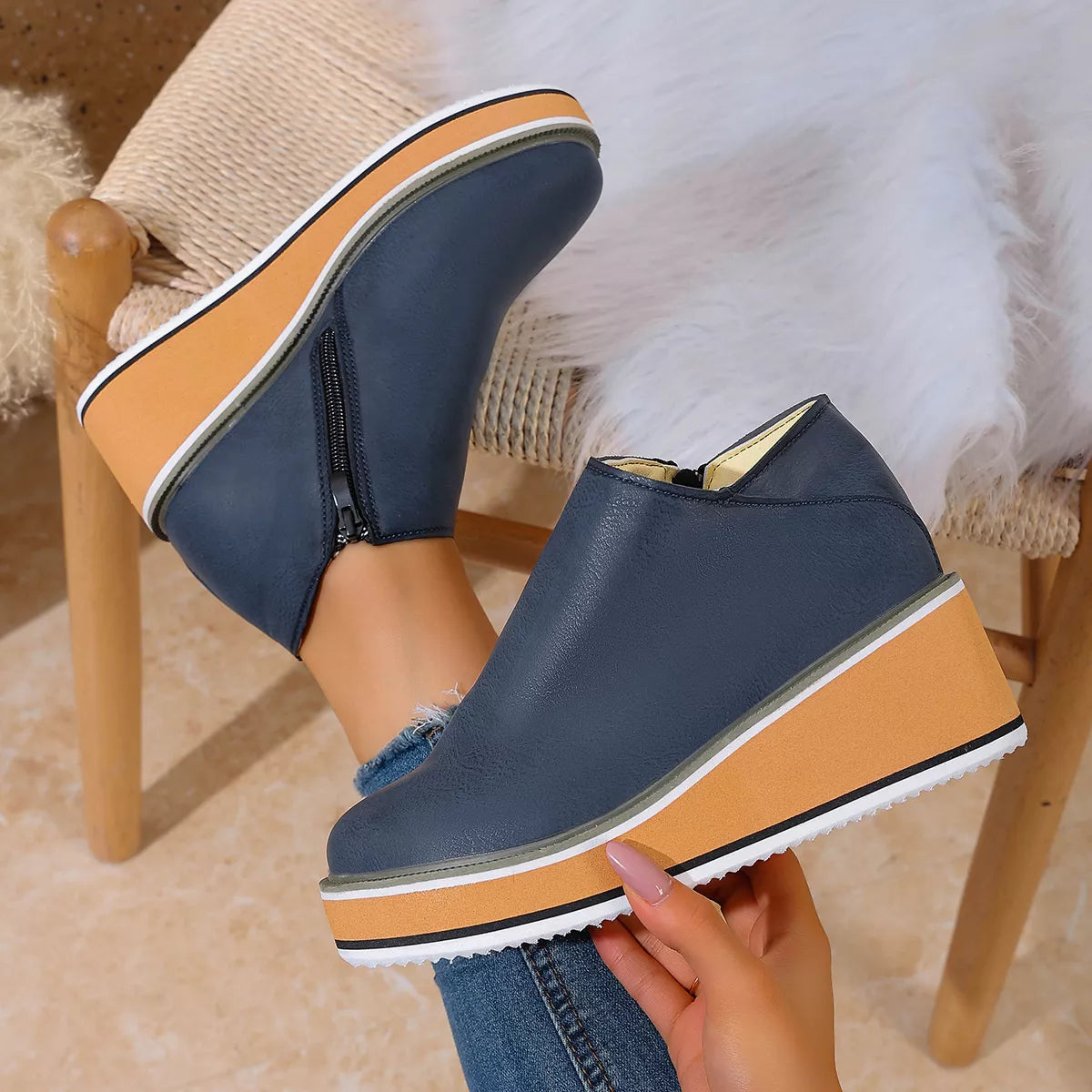 wedge ankle boots with zipper sole detail