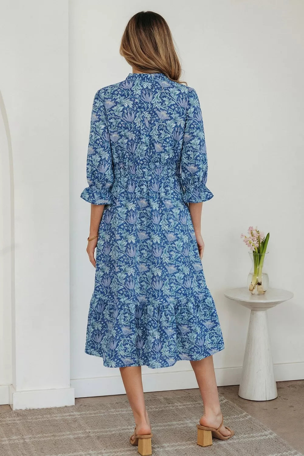 Dusty blue floral V neck tiered maxi dress side view