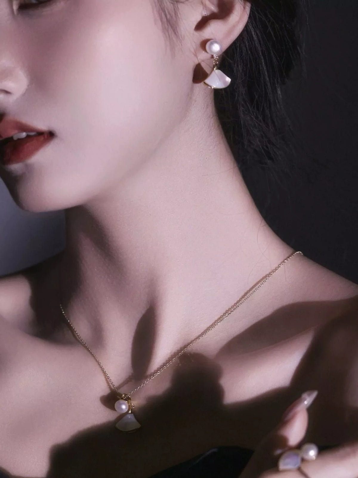 Gold freshwater pearl fan shaped drop earrings