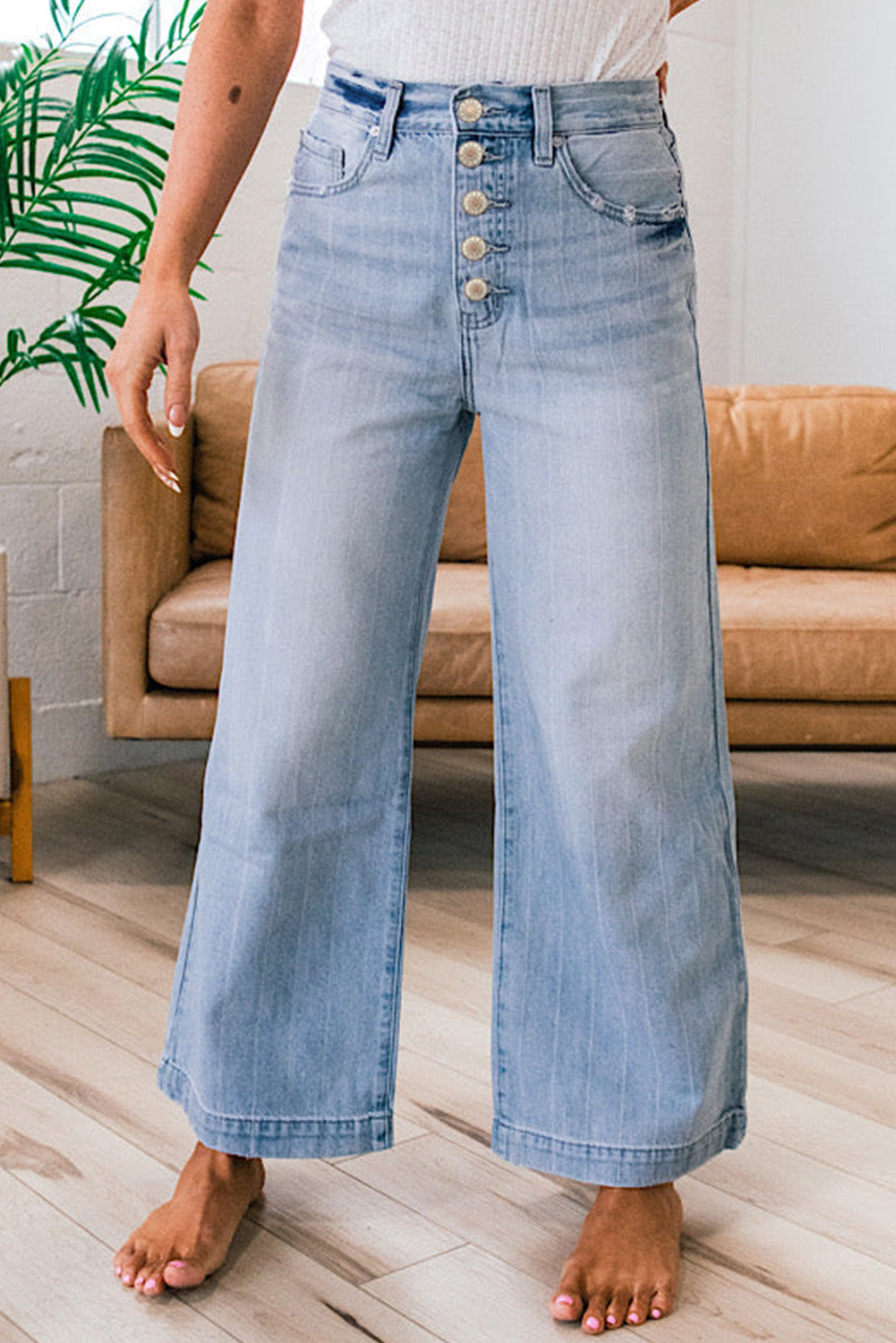 Blue wide leg jeans button detail