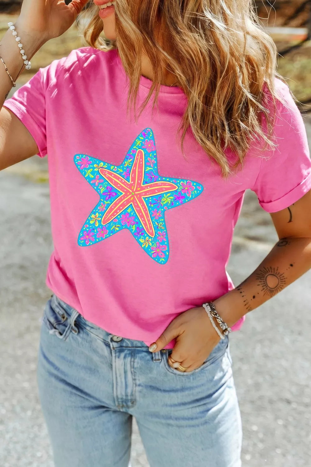 Starfish graphic round neck tee in fuchsia pink, front view