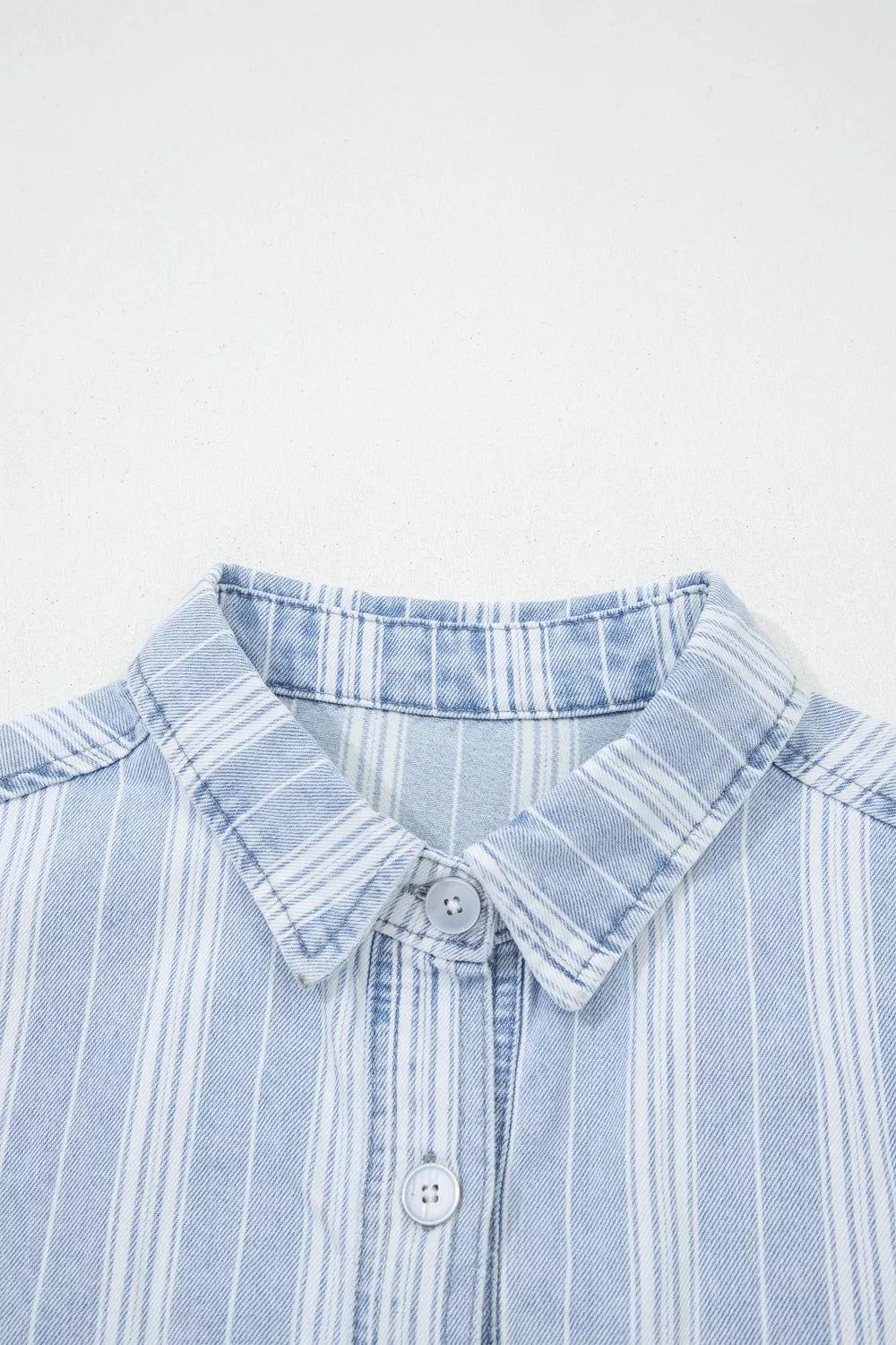 Striped denim shacket back view on a model