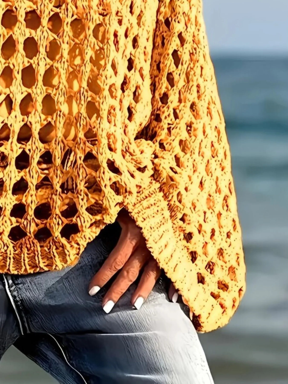 Crochet long sleeve knit cover up, neckline close up
