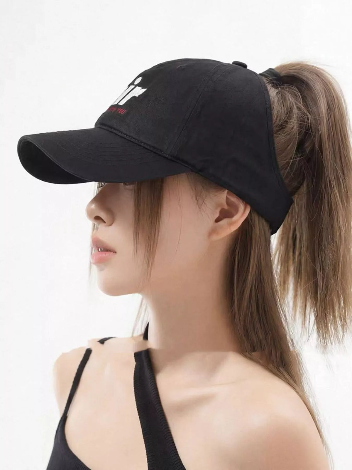 Close up of the embroidered letter on the cap