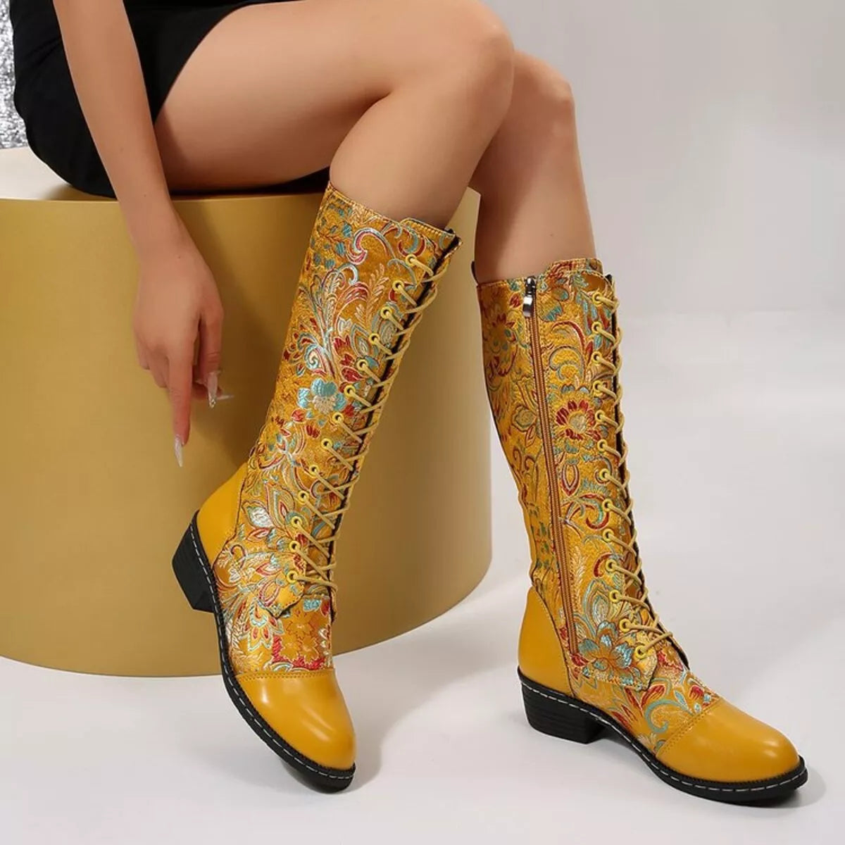 Lace up block heel boots angled studio view