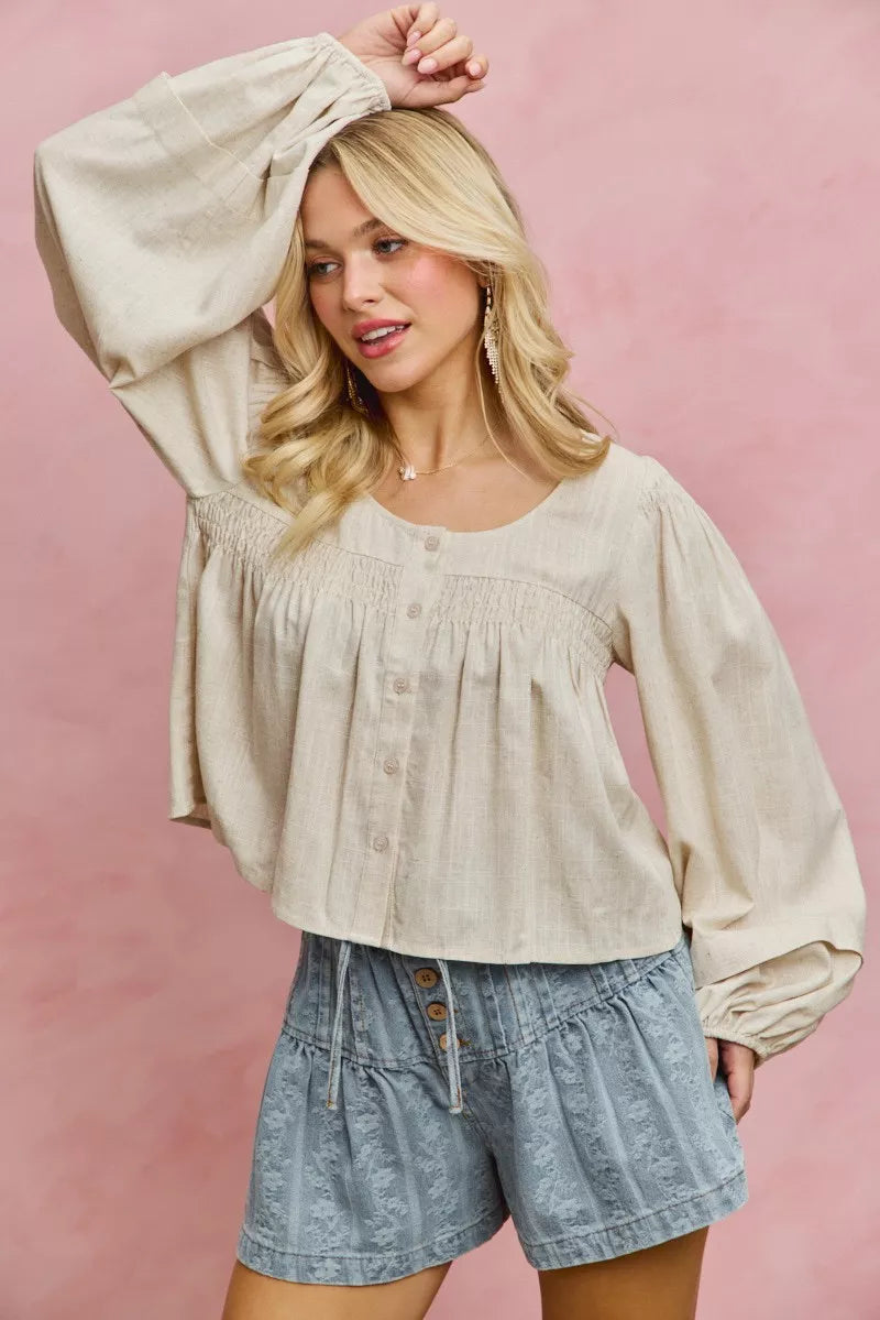 Cream linen blend smocked long sleeve top, front view