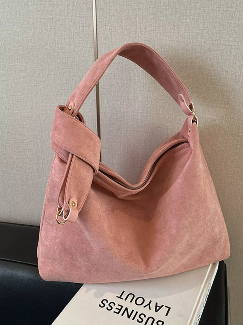 Suede knot shoulder bag in caramel front view