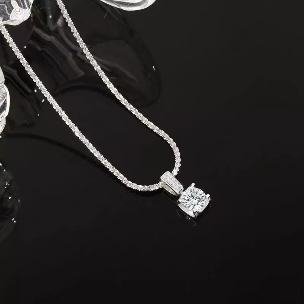 Silver chain detail on the 1ct moissanite necklace