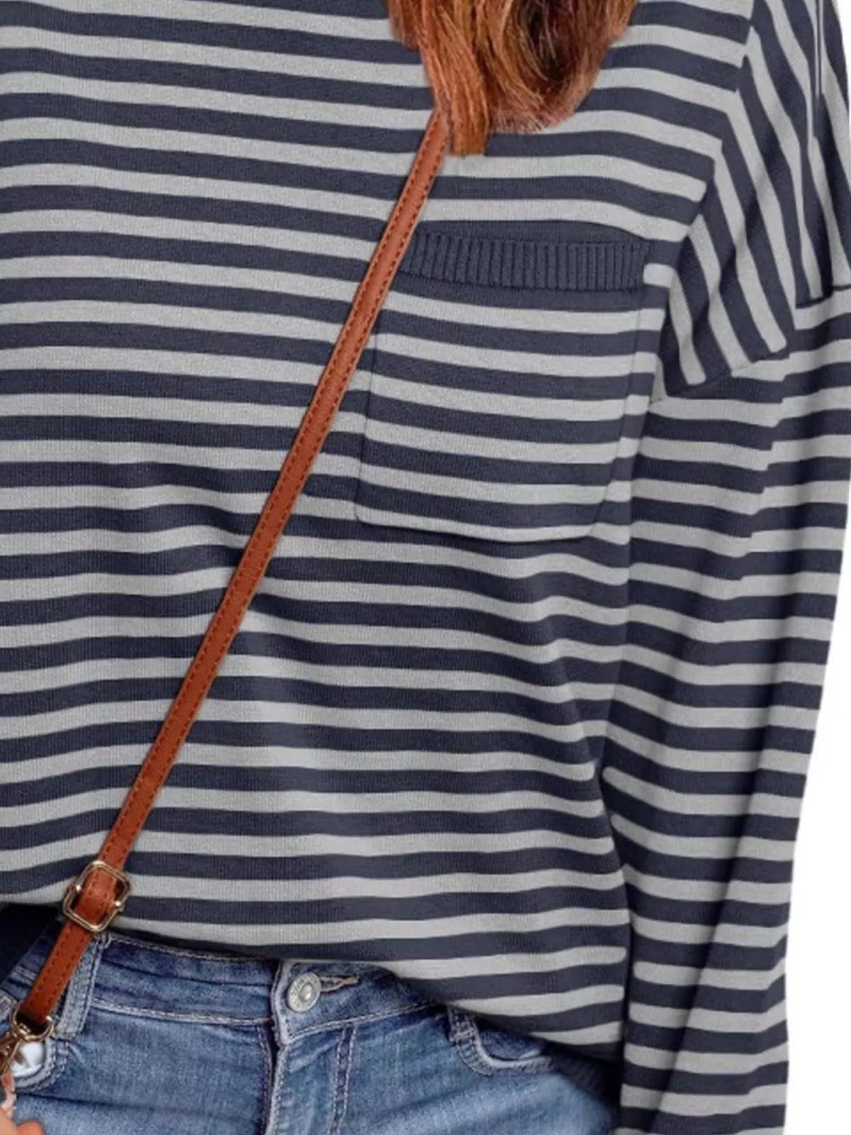 Striped round neck knit top side view