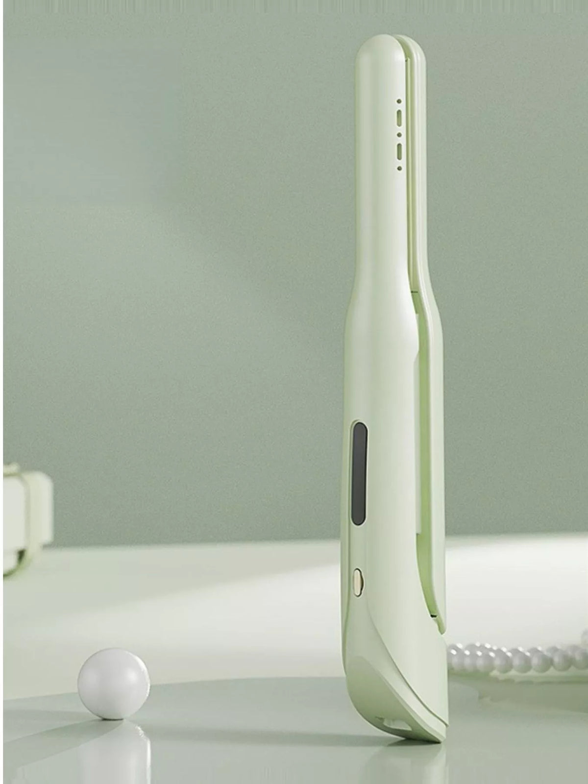 Light green cordless hair straightener